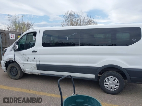 2023 Ford Transit Passenger XL with VIN 1FBAX2YG3PKA63237, listed as a IAAI auction lot 41996063 with 58,429 mi miles and . Bid and sale history available at DreamBid. Image 14.