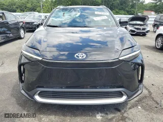 2024 Toyota bZ4X XLE with VIN JTMABACAXRA059167, listed as a Copart auction lot 61193474 with 3,830 mi miles and Salvage Title. Bid and sale history available at carsss.com. Image 5.