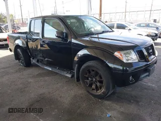 2020 Nissan Frontier SV with VIN 1N6ED0EA6LN724744, listed as a IAAI auction lot 41879935 with 51,376 mi miles and . Bid and sale history available at DreamBid. Image 1.