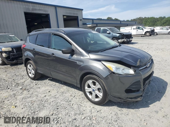 2016 Ford Escape SE with VIN 1FMCU9GX0GUC46005, listed as a Copart auction lot 53975955 with 124,994 mi miles and Salvage Title. Bid and sale history available at DreamBid. Image 4.