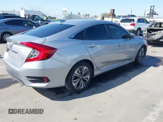 2017 Honda Civic Sedan EX-L with VIN 2HGFC1F76HH637432, listed as a IAAI auction lot 42007237 with 117,134 mi miles. Bid and sale history available at carsss.com. Image 4.