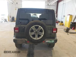 2021 Jeep Wrangler Unlimited Sahara z VIN 1C4HJXEN2MW592565, wystawiony jako IAAI lot #41956072 z przebiegiem 95 504 mil mil oraz . Historia ofert i sprzedaży dostępna na DreamBid. Obrazek 17.