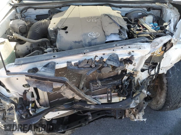 2015 Toyota Tacoma with VIN 3TMLU4ENXFM166481, listed as a Copart auction lot 54319585 with 120,120 mi miles and Salvage title. Bid and sale history available at DreamBid. Image 11.