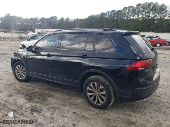 2018 Volkswagen Tiguan S with VIN 3VV1B7AXXJM105874, listed as a Copart auction lot 86565734 with 100,901 mi miles and Salvage Title. Bid and sale history available at carsss.com. Image 2.