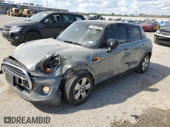 2016 MINI Hardtop 4 Door with VIN WMWXU1C55G2D09641, listed as a Copart auction lot 50567495 with 123,796 mi miles and Salvage Title. Bid and sale history available at DreamBid. Image 1.