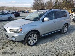 2010 Mitsubishi Outlander SE with VIN JA4AS3AW6AZ002930, listed as a Copart auction lot 85634404 with 157,321 mi miles and Salvage Title. Bid and sale history available at carsss.com. Image 1.