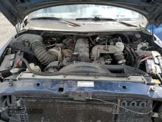 2000 Dodge 2500 z VIN 3B7KC2360YG146577, wystawiony jako Copart lot #57868995 z przebiegiem 360 637 mil mil oraz Tytuł czysty. Historia ofert i sprzedaży dostępna na DreamBid. Obrazek 11.
