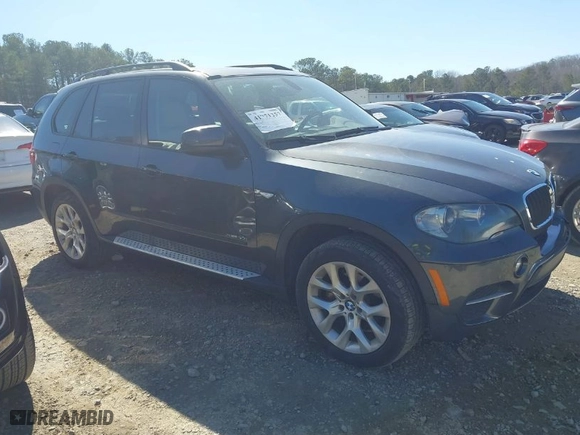 2011 BMW X5 35i with VIN 5UXZV4C51BL740731, listed as a IAAI auction lot 41771257 with 148,638 mi miles. Bid and sale history available at carsss.com. Image 1.