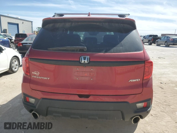 2023 Honda Passport EX-L with VIN 5FNYF8H57PB007264, listed as a Copart auction lot 48942955 with 18,013 mi miles and Salvage Title. Bid and sale history available at DreamBid. Image 6.