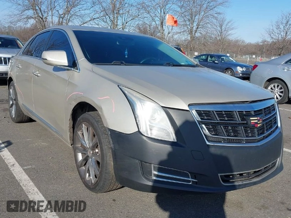 2013 Cadillac XTS Luxury z VIN 2G61R5S31D9185009, wystawiony jako IAAI lot #41243001 z przebiegiem 161 219 mil mil oraz . Historia ofert i sprzedaży dostępna na DreamBid. Obrazek 1.