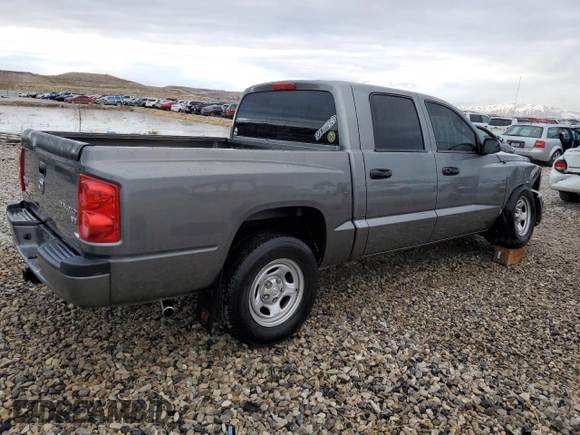 2011 Dodge Dakota с VIN 1D7RE2GK1BS585647, выставлен на аукционе Copart как лот 87689035 с пробегом 190 947 миль миль и Списание • Salvage title. История ставок и продаж доступна на DreamBid. Изображение 3.