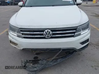 2020 Volkswagen Tiguan S with VIN 3VV1B7AX5LM079123, listed as a IAAI auction lot 41957273 with 89,449 mi miles and . Bid and sale history available at DreamBid. Image 6.