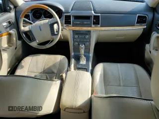 2012 Lincoln MKZ z VIN 3LNHL2GC7CR818220, wystawiony jako Copart lot #63058095 z przebiegiem 192 896 mil mil oraz Szkoda całkowita • Salvage title. Historia ofert i sprzedaży dostępna na DreamBid. Obrazek 8.