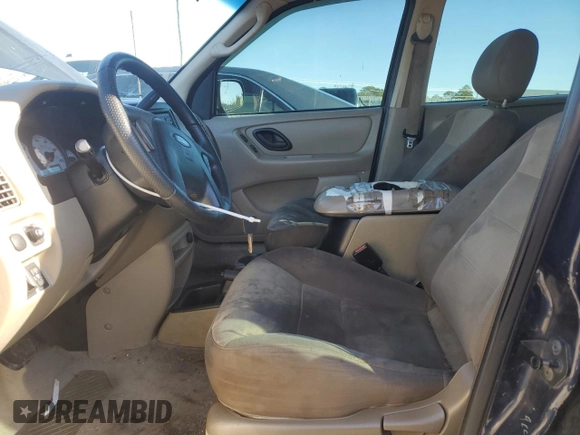 2004 Ford Escape XLS with VIN 1FMYU02184DA07091, listed as a Copart auction lot 84685754 with 212,257 mi miles and Salvage Title. Bid and sale history available at DreamBid. Image 7.