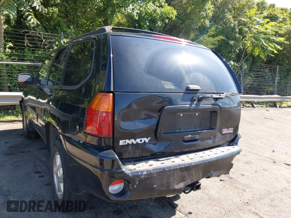 2005 GMC Envoy SLE with VIN 1GKDS13S452208252, listed as a IAAI auction lot 42357457 with 197,419 mi miles and . Bid and sale history available at DreamBid. Image 6.