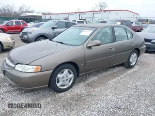 2001 Nissan Altima GXE with VIN 1N4DL01D81C187472, listed as a IAAI auction lot 41502436 with 195,203 mi miles. Bid and sale history available at carsss.com. Image 2.