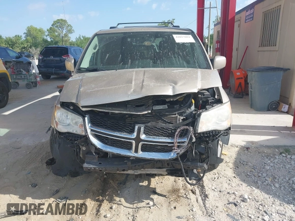 2014 Dodge Grand Caravan SXT with VIN 2C4RDGCG8ER244201, listed as a IAAI auction lot 42017091 with 161,653 mi miles and . Bid and sale history available at DreamBid. Image 6.