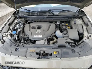 2024 Mazda CX-5 2.5 Carbon Turbo with VIN JM3KFBAY5R0403872, listed as a Copart auction lot 89161145 with 9,601 mi miles and Salvage Title. Bid and sale history available at carsss.com. Image 12.
