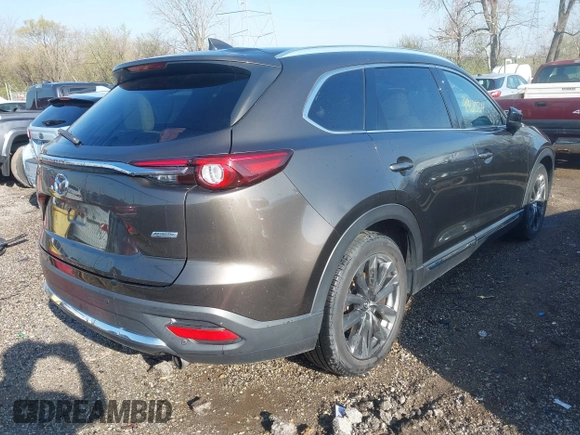 2016 Mazda CX-9 Grand Touring z VIN JM3TCBDY3G0104001, wystawiony jako IAAI lot #41961054 z przebiegiem 77 057 mil mil oraz . Historia ofert i sprzedaży dostępna na DreamBid. Obrazek 4.