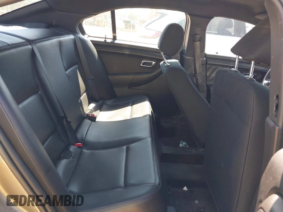 2013 Ford Police Interceptor with VIN 1FAHP2M82DG201735, listed as a IAAI auction lot 41886336 with 118,966 mi miles and . Bid and sale history available at DreamBid. Image 8.