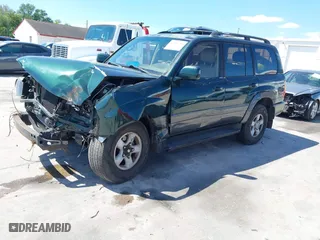 1998 Toyota Land Cruiser with VIN JT3HT05J2W0022171, listed as a IAAI auction lot 41886798 with 313,665 mi miles. Bid and sale history available at carsss.com. Image 2.