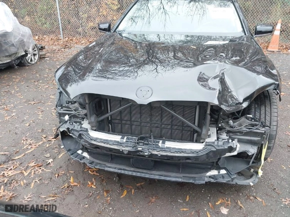 2020 BMW 7 Series 740i xDrive with VIN WBA7T4C03LGF97312, listed as a IAAI auction lot 40970033 with 60,231 mi miles. Bid and sale history available at carsss.com. Image 6.