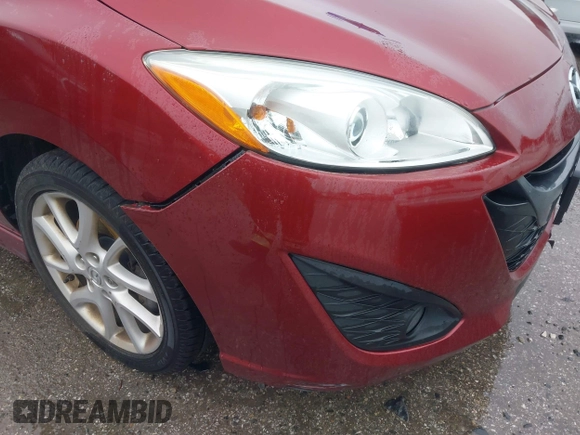 2012 Mazda 5 Grand Touring with VIN JM1CW2DL8C0142628, listed as a IAAI auction lot 42350676 with 84,764 mi miles and . Bid and sale history available at DreamBid. Image 14.