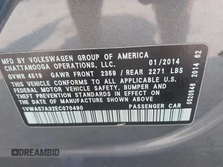2014 Volkswagen Passat Wolfsburg Edition with VIN 1VWAS7A32EC070490, listed as a IAAI auction lot 42373146 with 53,706 mi miles and . Bid and sale history available at DreamBid. Image 9.