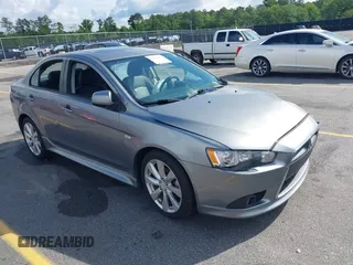 2013 Mitsubishi Lancer GT with VIN JA32U8FW4DU001656, listed as a IAAI auction lot 42247668 with 212,698 mi miles and . Bid and sale history available at DreamBid. Image 1.