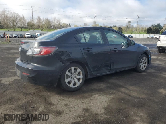 2013 Mazda 3 i SV with VIN JM1BL1TG1D1768990, listed as a Copart auction lot 51391385 with 77,069 mi miles and Salvage Title. Bid and sale history available at DreamBid. Image 3.