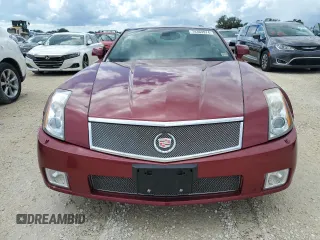 2006 Cadillac XLR z VIN 1G6YX36D165603774, wystawiony jako Copart lot #74369974 z przebiegiem Nie podano mil oraz Szkody całkowita. Historia ofert i sprzedaży dostępna na DreamBid. Obrazek 5.