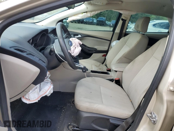 2018 Ford Focus SE z VIN 1FADP3F27JL226890, wystawiony jako Copart lot #56505085 z przebiegiem 112 865 mil mil oraz Szkoda całkowita • Salvage title. Historia ofert i sprzedaży dostępna na DreamBid. Obrazek 7.