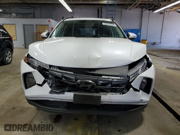 2022 Hyundai Tucson SEL with VIN 5NMJFCAE7NH137314, listed as a Copart auction lot 49349305 with 49,091 mi miles and Salvage Title. Bid and sale history available at carsss.com. Image 5.
