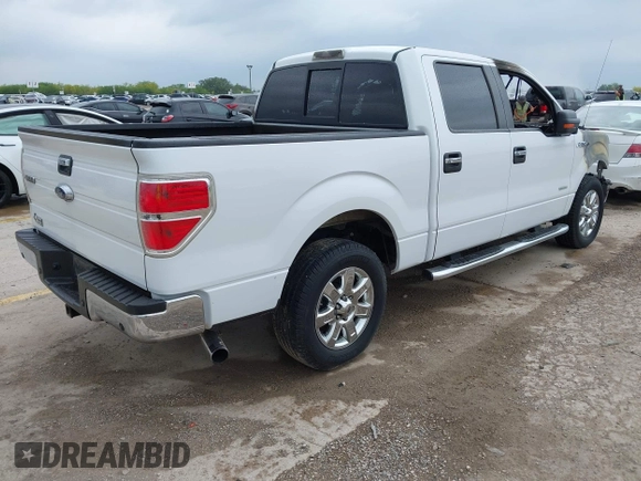 2014 Ford F-150 XL with VIN 1FTFW1CT9EKG46573, listed as a IAAI auction lot 42092411 with 94,879 mi miles and . Bid and sale history available at DreamBid. Image 4.