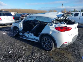 2018 BMW X2 xDrive28i with VIN WBXYJ5C31JEF78928, listed as a IAAI auction lot 40917288 with Not Provided miles. Bid and sale history available at carsss.com. Image 3.