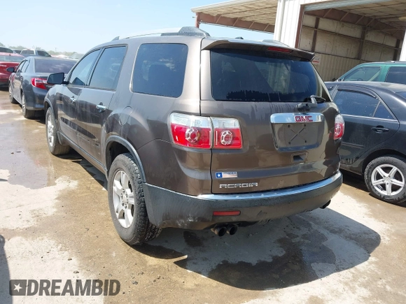 2011 GMC Acadia SL with VIN 1GKKRNED2BJ297121, listed as a IAAI auction lot 42128170 with 130,205 mi miles and . Bid and sale history available at carsss.com. Image 3.