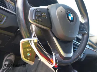 2016 BMW X1 xDrive28i with VIN WBXHT3Z35G4A49941, listed as a IAAI auction lot 41789774 with 111,661 mi miles and . Bid and sale history available at DreamBid. Image 11.