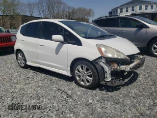 2009 Honda Fit Sport w/Navi with VIN JHMGE88619S012245, listed as a Copart auction lot 54332205 with 139,812 mi miles and Clean Title. Bid and sale history available at carsss.com. Image 4.