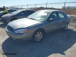 2007 Ford Taurus SEL with VIN 1FAFP56U97A130690, listed as a IAAI auction lot 41841077 with 131,516 mi miles. Bid and sale history available at carsss.com. Image 2.
