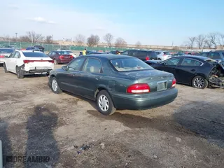 1999 Mazda 626 ES with VIN 1YVGF22C0X5835930, listed as a IAAI auction lot 41666820 with 93,973 mi miles. Bid and sale history available at carsss.com. Image 3.