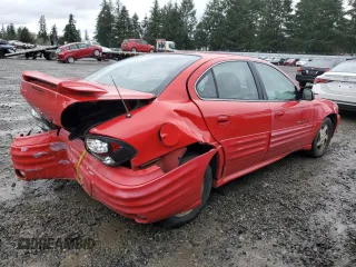 2000 Pontiac Grand Am SE1 with VIN 1G2NF52E9YM884376, listed as a Copart auction lot 86750694 with 106,097 mi miles and Salvage Title. Bid and sale history available at carsss.com. Image 3.