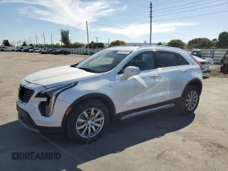 2022 Cadillac XT4 FWD Premium Luxury with VIN 1GYFZCR45NF100049, listed as a Copart auction lot 50213255 with 62,391 mi miles and Salvage Title. Bid and sale history available at carsss.com. Image 1.