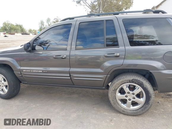 2004 Jeep Grand Cherokee Limited with VIN 1J8GX58N34C360819, listed as a IAAI auction lot 41816348 with 144,609 mi miles and . Bid and sale history available at DreamBid. Image 14.
