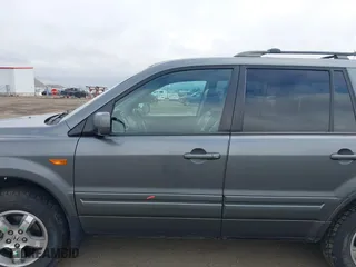 2008 Honda Pilot EX-L with VIN 5FNYF18748B029474, listed as a IAAI auction lot 41711002 with 185,035 mi miles. Bid and sale history available at carsss.com. Image 15.
