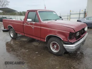 1989 Ford F-150 with VIN 1FTDF15Y7KNB52741, listed as a Copart auction lot 41561205 with 212,932 mi miles and Salvage Title. Bid and sale history available at carsss.com. Image 4.