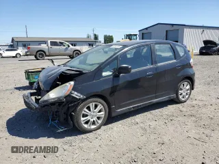 2009 Honda Fit Sport z VIN JHMGE88489S043605, wystawiony jako Copart lot #60164185 z przebiegiem 179 941 mil mil oraz Szkoda całkowita • Salvage title. Historia ofert i sprzedaży dostępna na DreamBid. Obrazek 1.