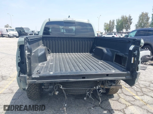 2022 Toyota Tacoma SR5 with VIN 3TMBZ5DN1NM035572, listed as a IAAI auction lot 42083925 with 82,596 mi miles and . Bid and sale history available at DreamBid. Image 6.