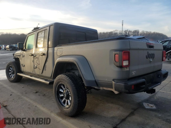 2022 Jeep Gladiator Willys с VIN 1C6HJTAG8NL107002, выставлен на аукционе Copart как лот 85138204 с пробегом 69 166 миль миль и Списание • Salvage title. История ставок и продаж доступна на DreamBid. Изображение 2.