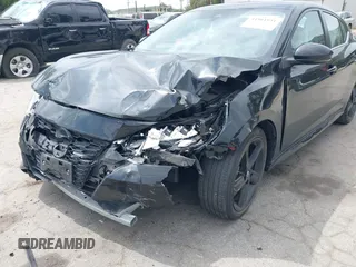 2022 Nissan Sentra SR z VIN 3N1AB8DV3NY295100, wystawiony jako IAAI lot #41901931 z przebiegiem 40 811 mil mil oraz . Historia ofert i sprzedaży dostępna na DreamBid. Obrazek 6.