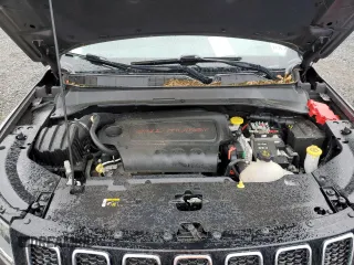2021 Jeep Compass Limited z VIN 3C4NJDCB3MT516014, wystawiony jako Copart lot #56942955 z przebiegiem 65 459 mil mil oraz Szkoda całkowita • Salvage title. Historia ofert i sprzedaży dostępna na DreamBid. Obrazek 12.